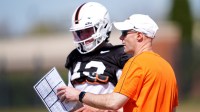 Oklahoma State quarterbacks coach Kevin Johns talks with Garret Rangel during a Spring football practice at Oklahoma State University in Stillwater, Okla., Tuesday, April, 8, 2025.