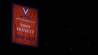 A general view of the banner for Tony Bennett (not pictured) at John Paul Jones Arena during a halftime celebration against the Georgia Tech Yellow Jackets.