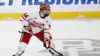Boston University defenseman Cole Hutson (44) skates with the puck in the third period against the Cornell at Huntington Center.