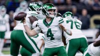 New York Jets quarterback Brady Cook (4) passes against the New Orleans Saints during the second half at Caesars Superdome.