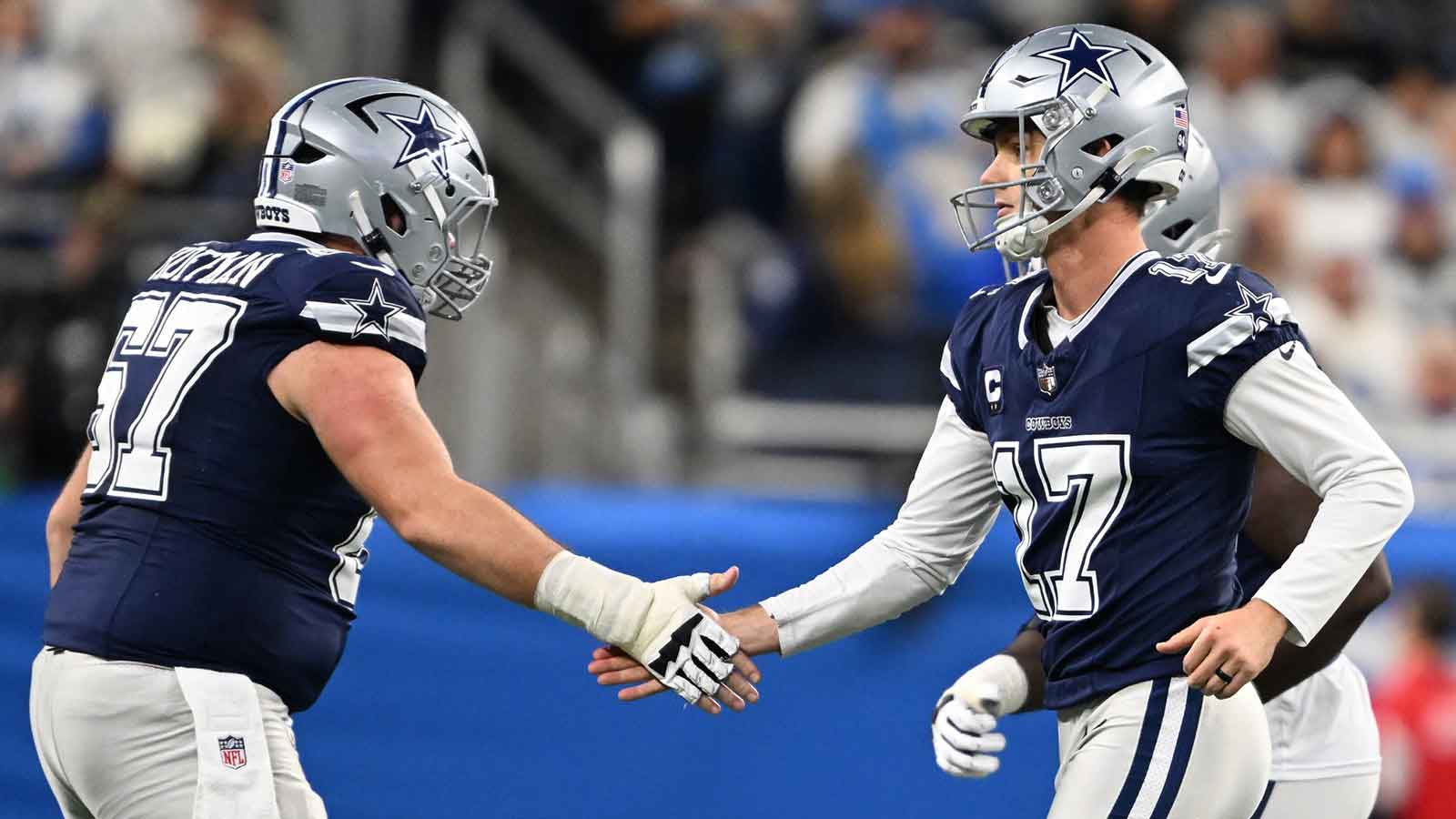 Dallas Cowboys place kicker Brandon Aubrey (17) celebrates with center Brock Hoffman (67) after making a field goal during the second half against the Detroit Lions at Ford Field.
