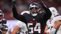 Atlanta Falcons defensive tackle Brandon Dorlus (54) reacts after a tackle against the Miami Dolphins in the third quarter at Mercedes-Benz Stadium.