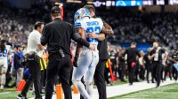 Detroit Lions safety Brian Branch (32) with help of Lions staff, walk off the field due to an injury during the second half against Dallas Cowboys at Ford Field in Detroit on Thursday, Dec. 4, 2025.