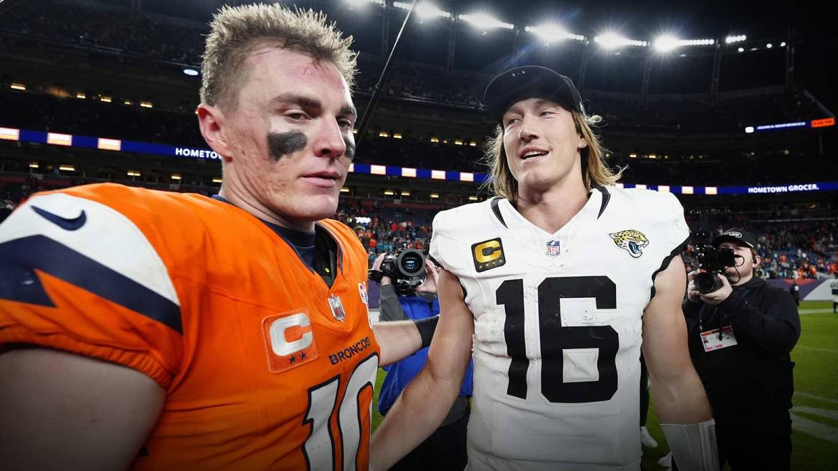 Denver Broncos quarterback Bo Nix (10) and Jacksonville Jaguars quarterback Trevor Lawrence (16) meet after the game at Empower Field at Mile High.
