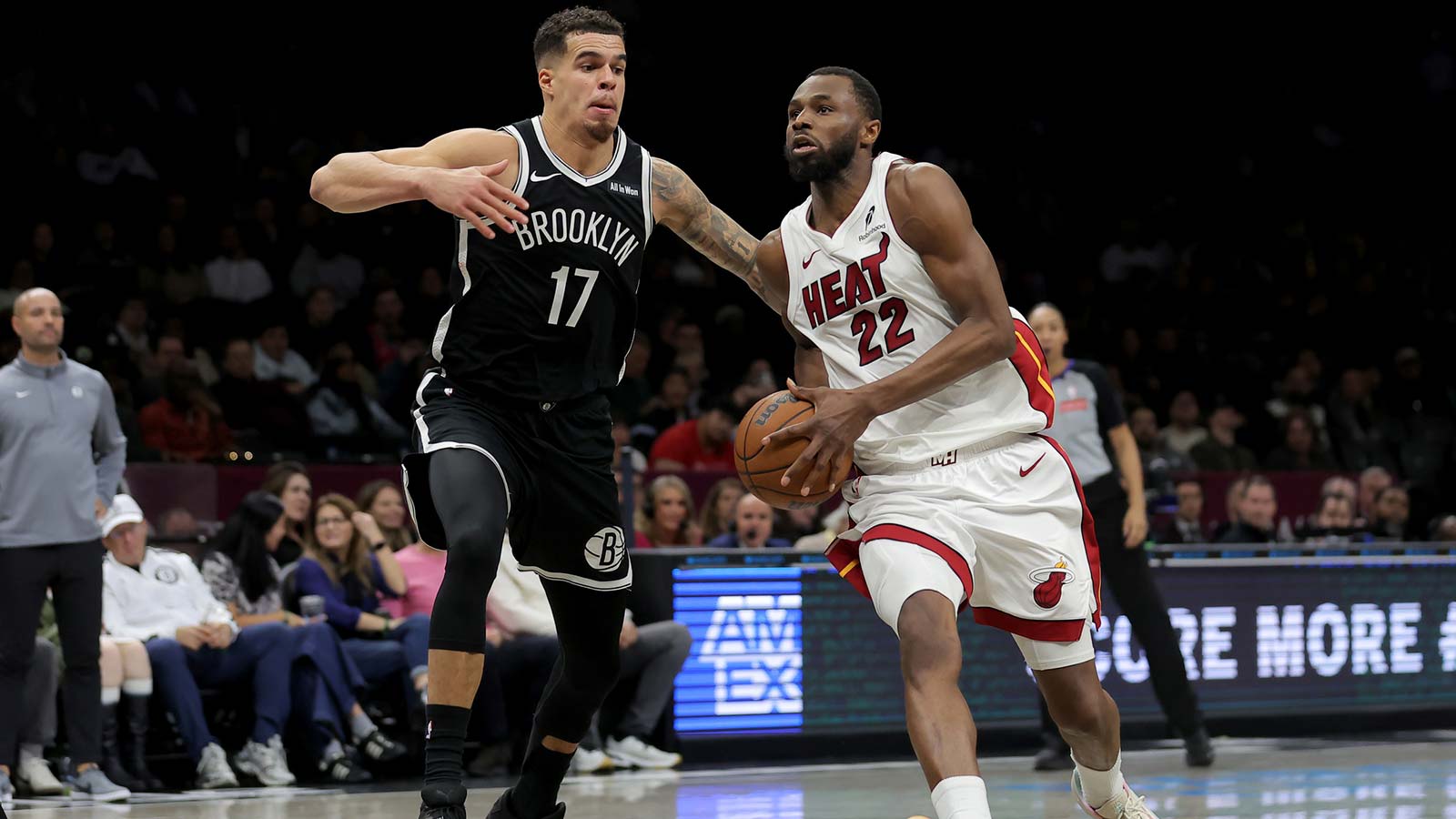 Miami Heat forward Andrew Wiggins (22) drives to the basket against Brooklyn Nets forward Michael Porter Jr. (17) during the fourth quarter at Barclays Center.