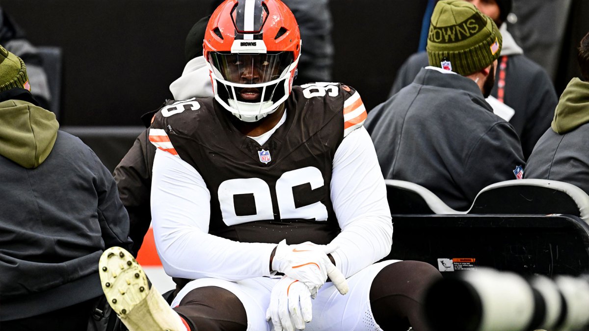 ; Cleveland Browns defensive tackle Maliek Collins (96) is led off the field after an injury during the second half against the San Francisco 49ers at Huntington Bank Field.
