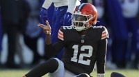 Cleveland Browns quarterback Shedeur Sanders (12) signals a first down during the second half of an NFL football game at Huntington Bank Field, Dec. 21, 2025, in Cleveland, Ohio.
