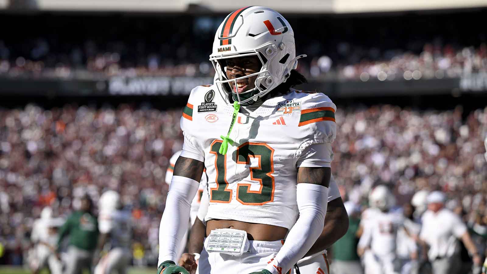 Miami Hurricanes defensive back Bryce Fitzgerald (13) celebrates after he intercepts a Texas A&M Aggies pass to clinch the Miami win at Kyle Field.