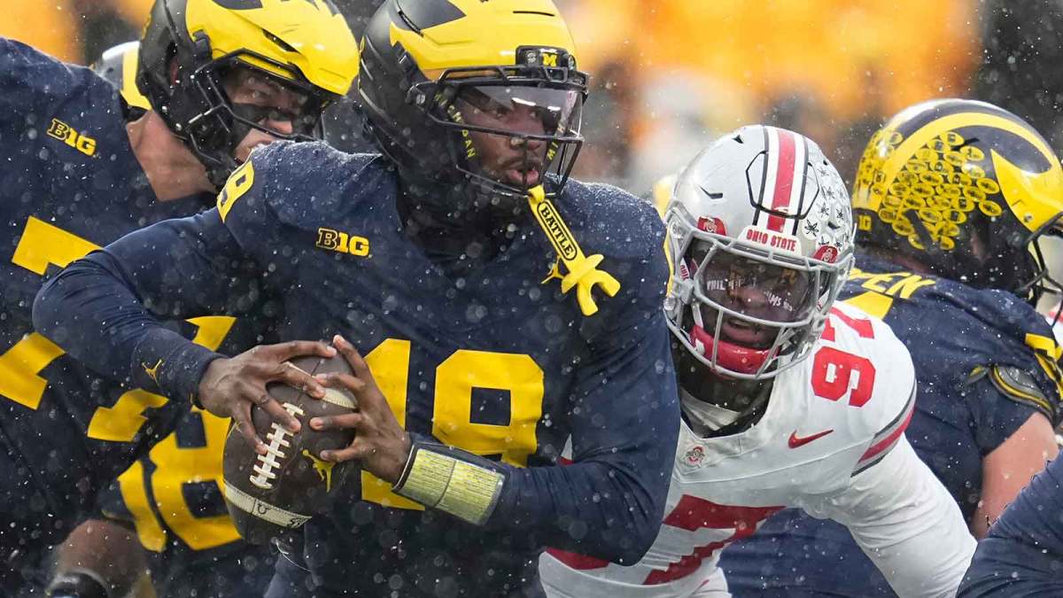 Ohio State Buckeyes defensive end Kenyatta Jackson Jr. (97) sacks Michigan Wolverines quarterback Bryce Underwood (19) during the NCAA football game at Michigan Stadium in Ann Arbor, Mich. on Nov. 29, 2025. Ohio State won 27-9.