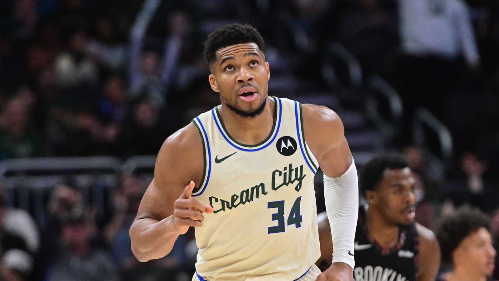 Milwaukee Bucks forward Giannis Antetokounmpo (34) reacts after scoring his 21,000th career point in the third quarter against the Brooklyn Nets at Fiserv Forum.