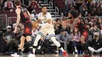 Chicago Bulls guard Coby White (0) defends Milwaukee Bucks forward Giannis Antetokounmpo (34)during the first half at United Center.