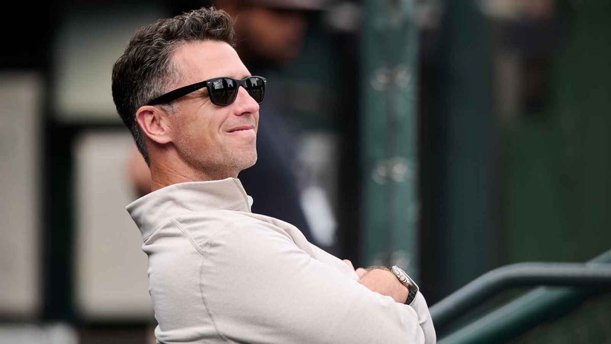 San Francisco Giants president of baseball operations Buster Posey sits in the dugout before the game against the Arizona Diamondbacks at Oracle Park.