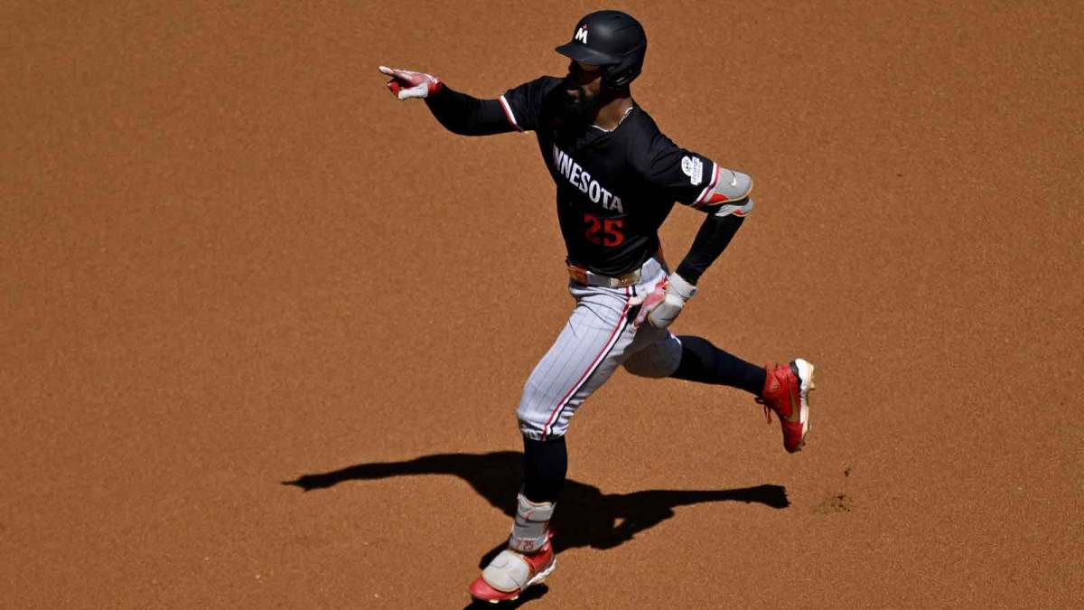 Minnesota Twins center fielder Byron Buxton (25) rounds second base after he hits a leadoff home run against the Texas Rangers during the first inning at Globe Life Field.