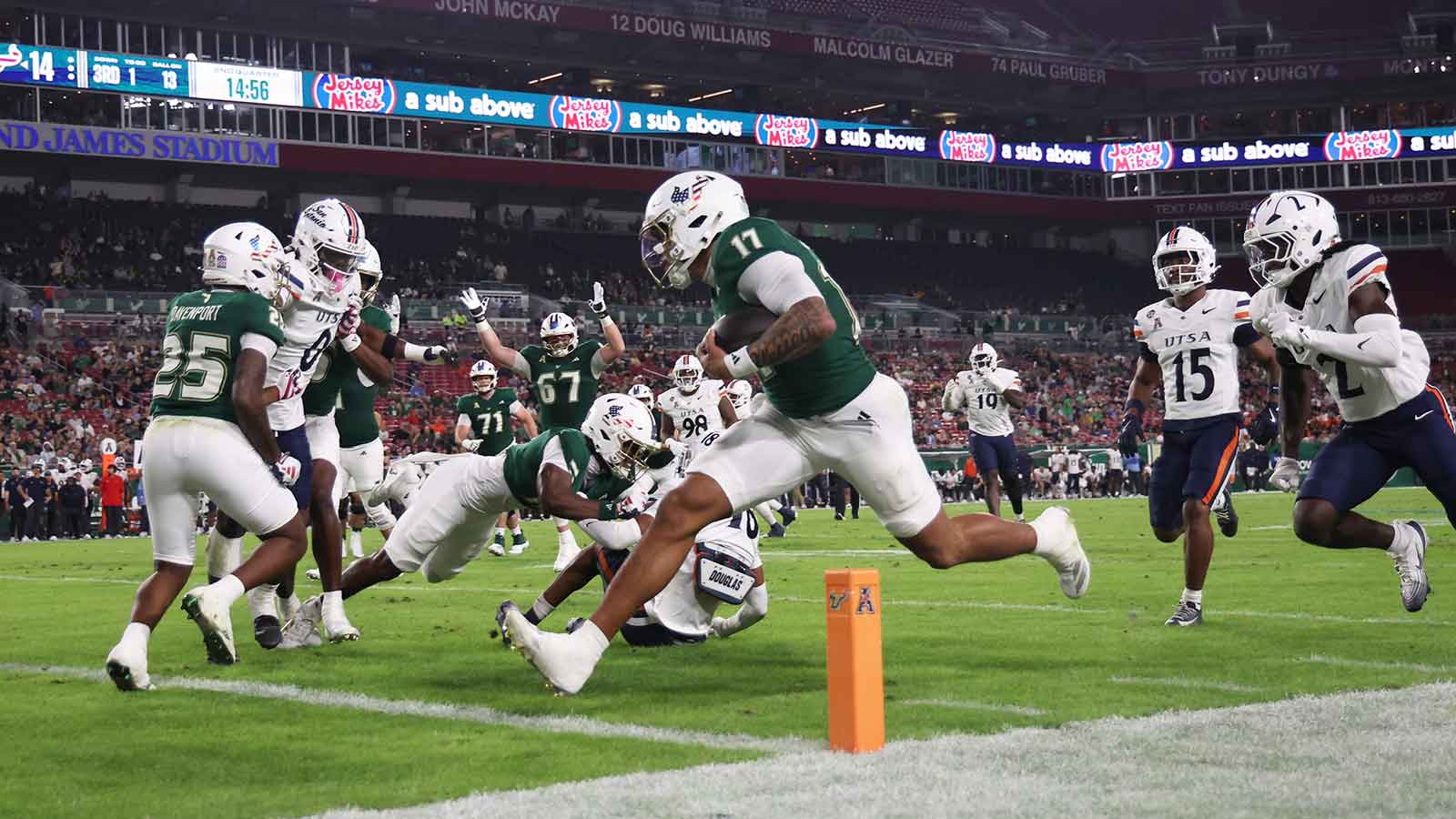 South Florida Bulls quarterback Byrum Brown (17) runs the ball in for a touchdown against the UTSA Roadrunners during the first half at Raymond James Stadium.