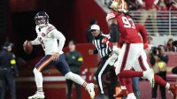 Chicago Bears quarterback Caleb Williams (18) runs against the San Francisco 49ers in the first half at Levi's Stadium