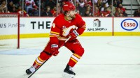 Calgary Flames defenseman Rasmus Andersson (4) controls the puck against the Detroit Red Wings during the third period at Scotiabank Saddledome.