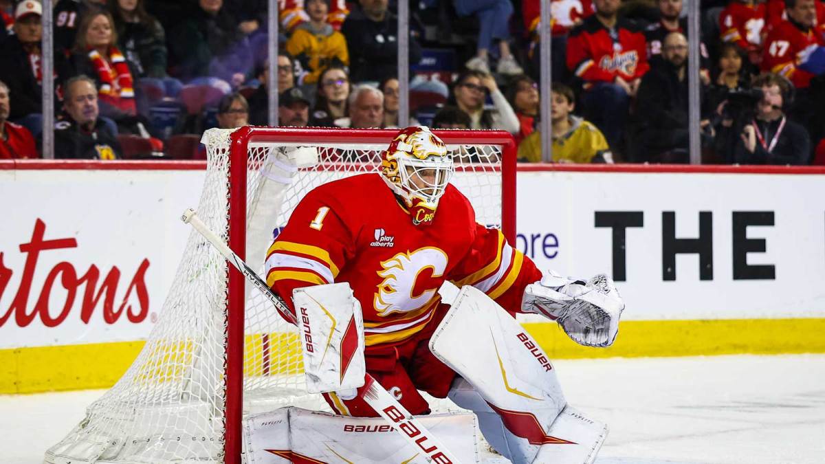Calgary Flames goaltender Devin Cooley (1) guards his net against the Vegas Golden Knights during the third period at Scotiabank Saddledome.