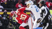 Los Angeles Chargers cornerback Cam Hart (20) breaks up a pass intended for Kansas City Chiefs wide receiver Tyquan Thornton (80) during the second quarter at GEHA Field at Arrowhead Stadium.