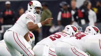 Arizona Cardinals quarterback Jacoby Brissett (7) calls an audible against the Houston Texans in the third quarter at NRG Stadium.