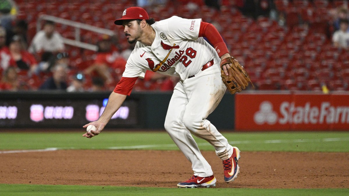 St. Louis Cardinals third baseman Nolan Arenado (28) fields a ground ball hit by Cincinnati Reds third baseman Santiago Espinal (not pictured) in the ninth inning at Busch Stadium.