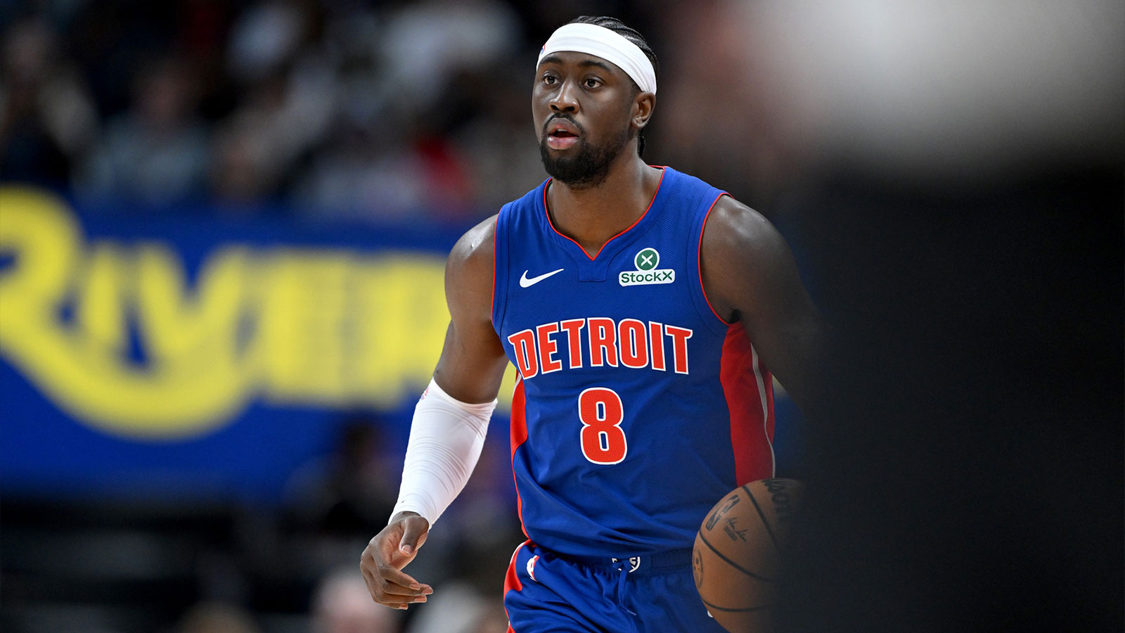 Detroit Pistons guard Caris LeVert (8) takes the ball up the court against the Atlanta Hawks in the second quarter at Little Caesars Arena.