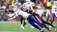 England Patriots cornerback Carlton Davis III (7) draws a pass interference penalty breaking up a catch intended for Buffalo Bills wide receiver Keon Coleman (0) during the second half at Gillette Stadium.