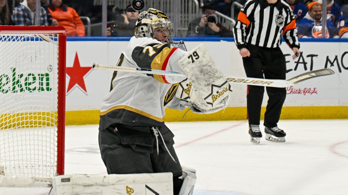 Vegas Golden Knights goaltender Carter Hart (79) makes a save against the New York Islanders during the second period at UBS Arena.