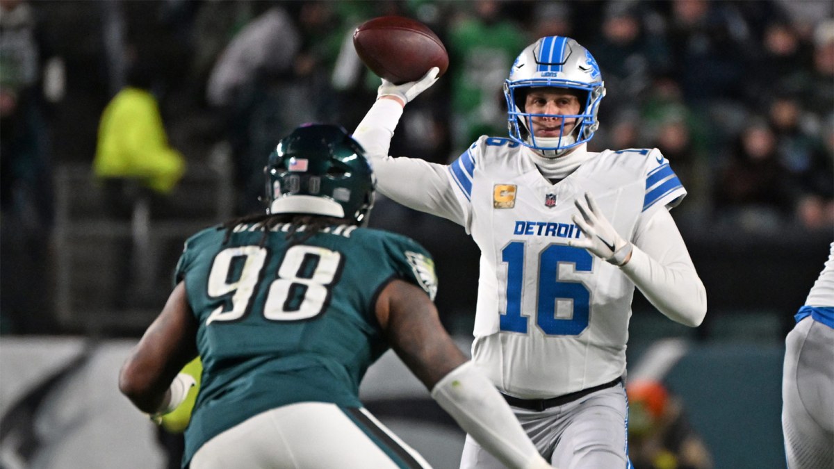 Detroit Lions quarterback Jared Goff (16) throws a pass under pressure form Philadelphia Eagles defensive tackle Jalen Carter (98) during the second half at Lincoln Financial Field.