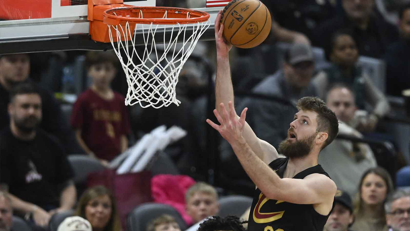  Cleveland Cavaliers forward Dean Wade (32) drives to the basket in the fourth quarter against the Charlotte Hornets at Rocket Arena.