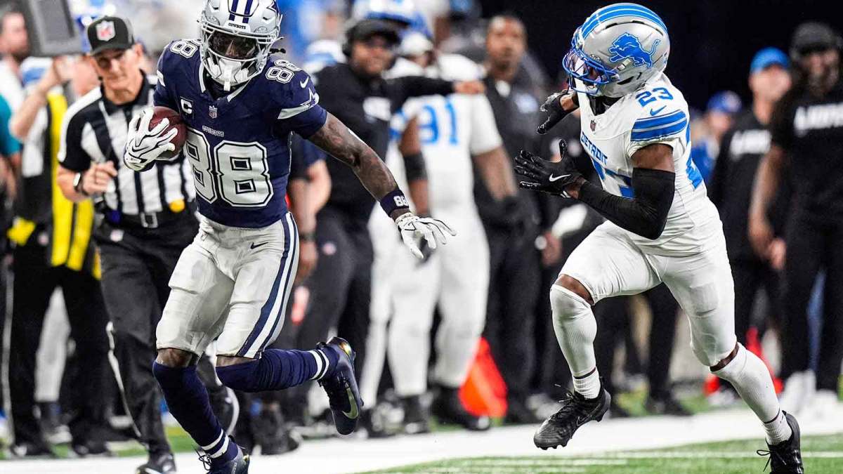 Dallas Cowboys wide receiver CeeDee Lamb makes a catch against Detroit Lions cornerback Rock Ya-Sin during the first half at Ford Field in Detroit on Thursday, Dec. 4, 2025.