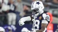 Dallas Cowboys wide receiver CeeDee Lamb (88) celebrates after catching a pass against the Kansas City Chiefs during the fourth quarter at AT&T Stadium.