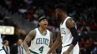Celtics guard Isaiah Thomas (4) celebrates a play with forward Jaylen Brown (7) in the third quarter of their game against the Atlanta Hawks at Philips Arena. The Hawks won 123-116