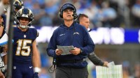 Los Angeles Chargers head coach Jim Harbaugh looked on from the sidelines against the Houston Texans during the second half at SoFi Stadium.