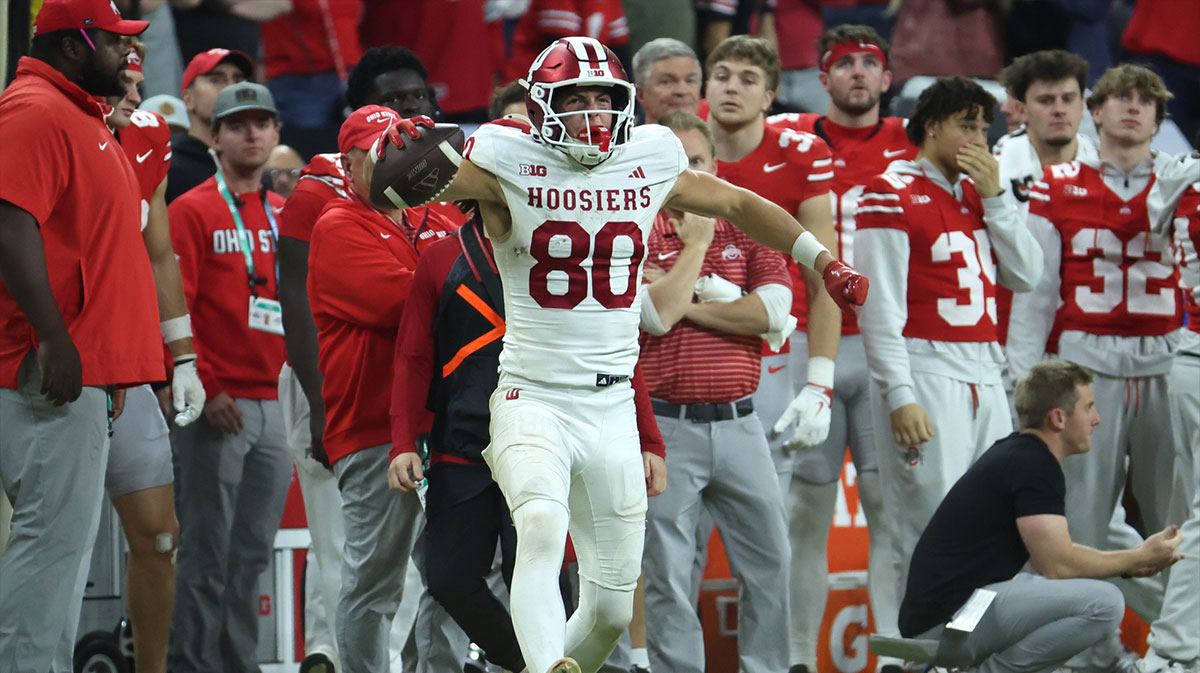 Indiana Hoosiers wide receiver Charlie Becker (80) celebrates after a catch against the Ohio State Buckeyes in the fourth quarter during the 2025 Big Ten championship game at Lucas Oil Stadium.