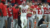 Indiana Hoosiers wide receiver Charlie Becker (80) celebrates after a catch against the Ohio State Buckeyes in the fourth quarter during the 2025 Big Ten championship game at Lucas Oil Stadium.