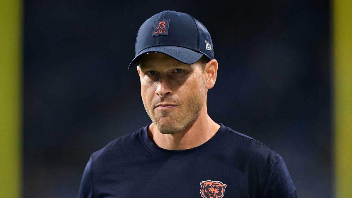 Chicago Bears head coach Ben Johnson looks on during warmups prior to the game against the Detroit Lions at Ford Field.