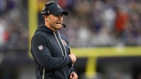 Chicago Bears head coach Ben Johnson stands on the sidelines during the fourth quarter against the Minnesota Vikings at U.S. Bank Stadium.