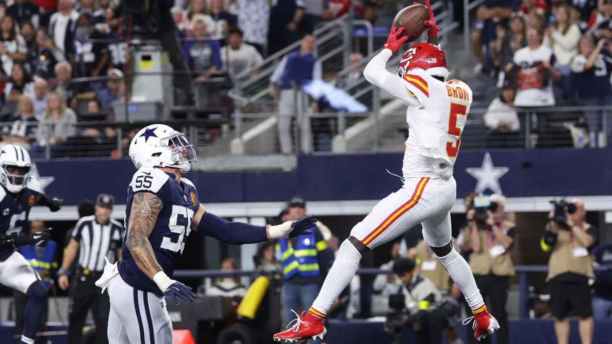Kansas City Chiefs wide receiver Hollywood Brown (5) catches a pass for a touchdown against Dallas Cowboys linebacker Logan Wilson (55) during the fourth quarter at AT&T Stadium.