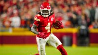 Kansas City Chiefs wide receiver Rashee Rice (4) runs with the ball during the second half against the Washington Commanders at GEHA Field at Arrowhead Stadium.