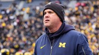 Michigan offensive coordinator Chip Lindsey watches warmup ahead of the Ohio State game at Michigan Stadium in Ann Arbor on Saturday, Nov. 29, 2025.