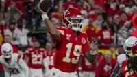 Kansas City Chiefs quarterback Chris Oladokun (19) throws the ball during the fourth quarter at GEHA Field at Arrowhead Stadium.