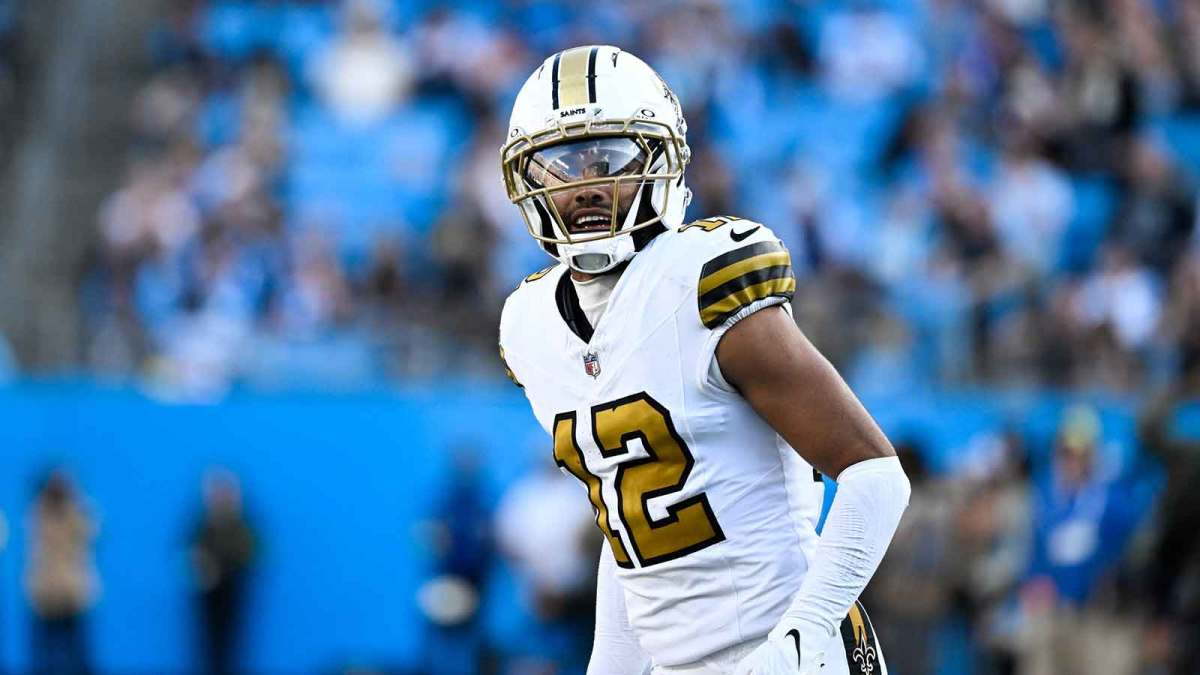 New Orleans Saints wide receiver Chris Olave (12) looks on during the fourth quarter against the Carolina Panthers at Bank of America Stadium.