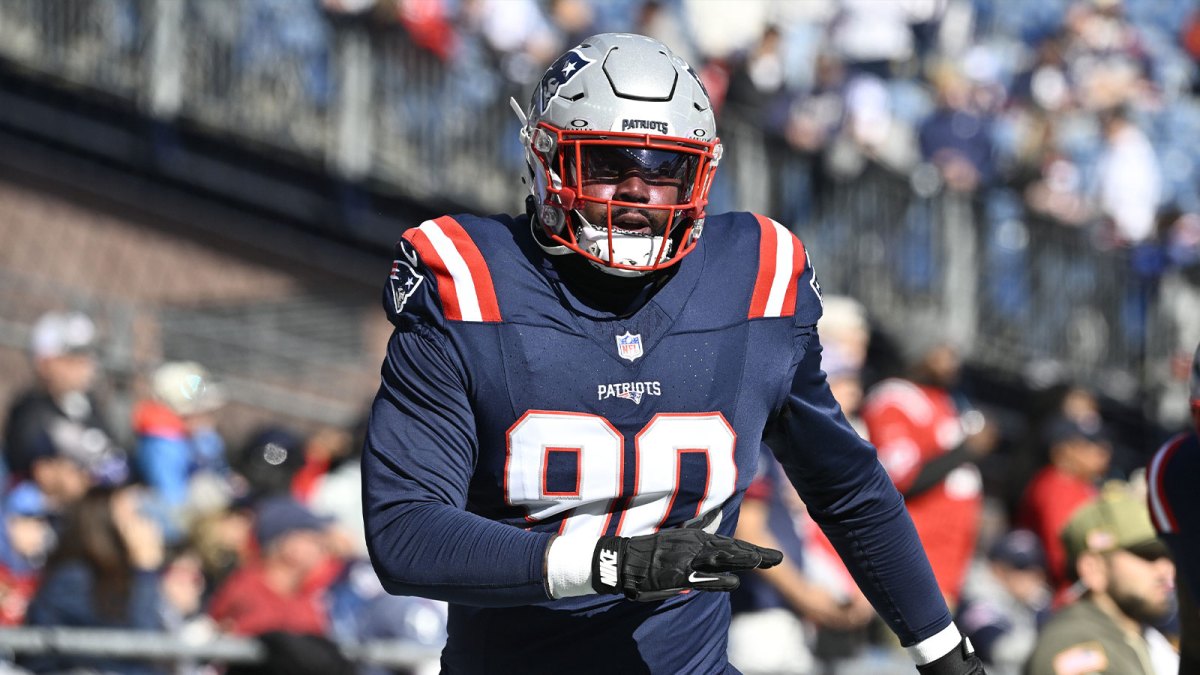 New England Patriots defensive tackle Christian Barmore (90) warms up prior to the game against the Atlanta Falcons at Gillette Stadium