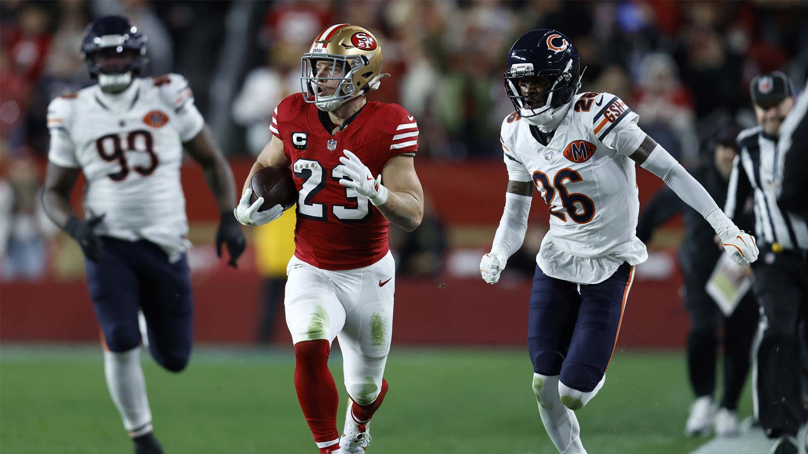San Francisco 49ers running back Christian McCaffrey (23) runs against Chicago Bears cornerback Nahshon Wright (26) in the first half at Levi's Stadium.