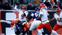 Baltimore Ravens defensive end Dre'Mont Jones (41) forces Cincinnati Bengals quarterback Joe Burrow (9) to throw an incomplete pass in the fourth quarter of the NFL football game at Paycor Stadium in Cincinnati on Dec. 14, 2025.
