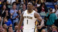 New Orleans Pelicans forward Zion Williamson (1) reacts after a dunk against the Los Angeles Clippers during the fourth quarter at Smoothie King Center.