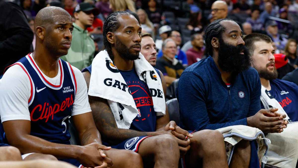 Los Angeles Clippers guard Chris Paul (3) and forward Kawhi Leonard (2) and guard James Harden (1) sit on the bench during the fourth quarter against the Sacramento Kings at Golden 1 Center.