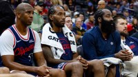 Los Angeles Clippers guard Chris Paul (3) and forward Kawhi Leonard (2) and guard James Harden (1) sit on the bench during the fourth quarter against the Sacramento Kings at Golden 1 Center.