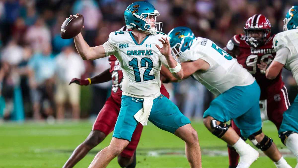 Coastal Carolina Chanticleers quarterback Tad Hudson (12) passes against the South Carolina Gamecocks in the second half at Williams-Brice Stadium.