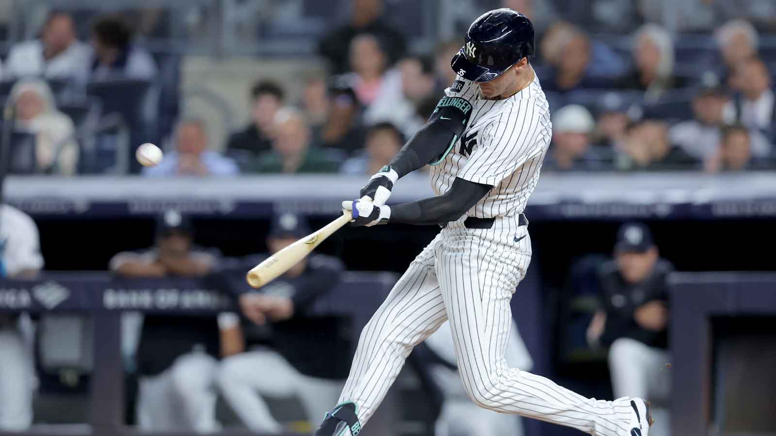 New York Yankees left fielder Cody Bellinger (35) hits a solo home run against the Detroit Tigers during the fourth inning at Yankee Stadium. 